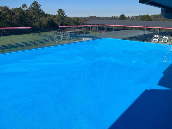 Fresh blue waterproofing membrane on a deck